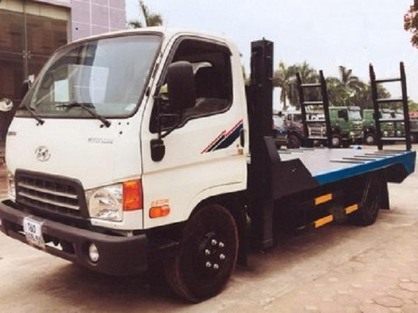 xe tải Hyundai HD99 nâng đầu chở máy công trình